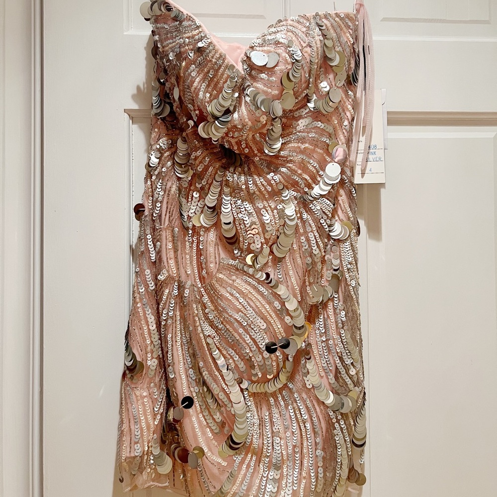 Sherri Hill strapless cocktail dress with sequence. Never worn!! Tags on dress!!